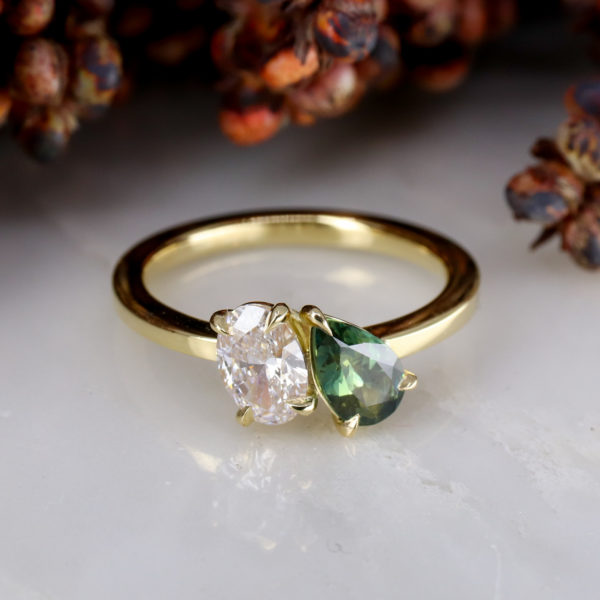18ct yellow gold Toi et Moi ring with diamond and green sapphire